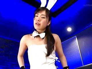 Curious Awesome Asian girl in a bunny costume gives a...