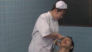 Close Awesome Steamy nurses pleases patient with a new treatment Face Fucking