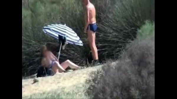 Pervert granny masturbates in front of stranger at beach - 1