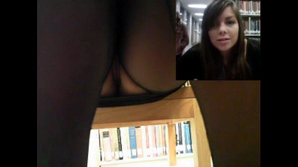 Horny slut masturbating in the library - 1