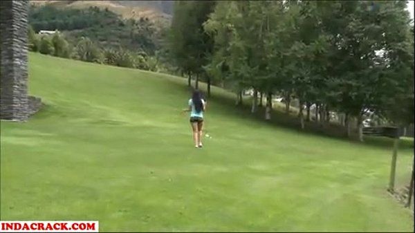 Sexy Brunette play golf - 1