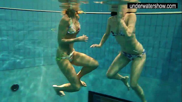 Two sexy amateurs showing their bodies off under water - 2