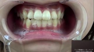 BootyFix A woman shows her gums and sputs saliva Jap