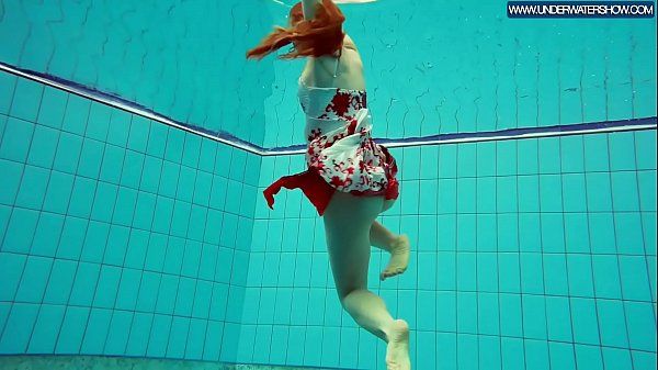 Hot Polish redhead swimming in the pool - 1
