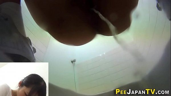 Hairy asian filmed peeing - 1