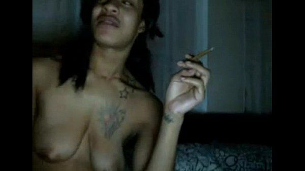 Tattooed girl smoking weed on webcam Amateur