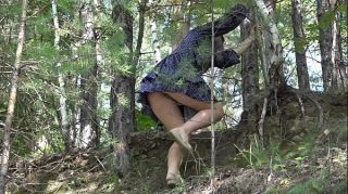 Morazzia Under a skirt without panties. Hairy pussy and big ass in a short dress climbs mountains in nature. Solo Girl