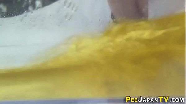 Fetish asian babes pee into glass box - 2