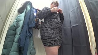 PornDT A hidden camera in the changing room is spying on a BBW with big booty. Fetish in a public mall. Masturbate