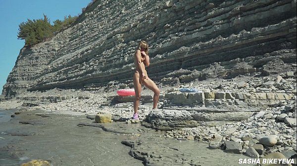FREE VIDEO - Awesome kinky nudist girl in the public beach - Sasha Bikeyeva - 1