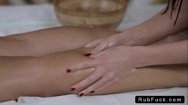 Masseuse massages hot body of brunette babe - 2